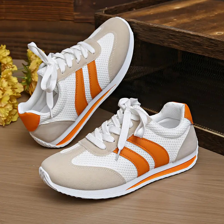 Side view of women's retro Zippa sneakers, showcasing unique design & sporty chic style for comfort.
