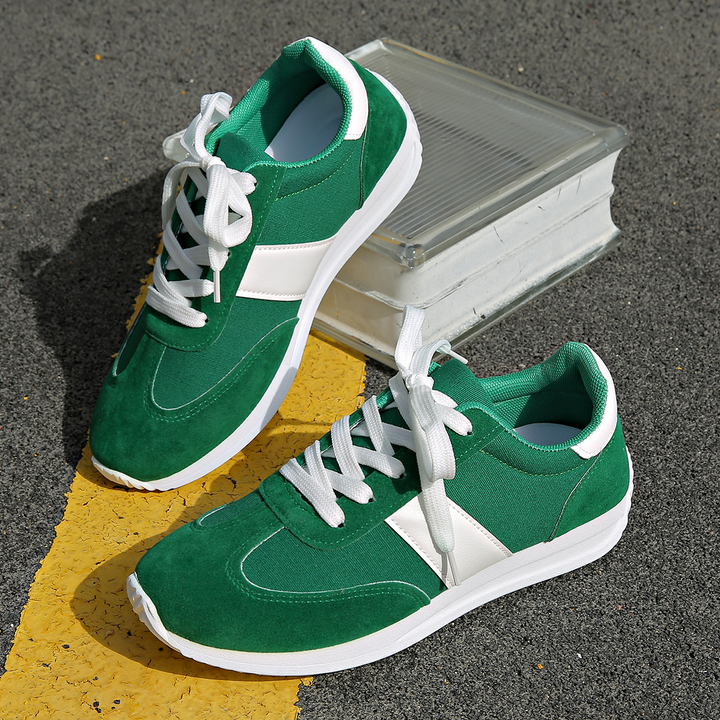 Grey women's retro Zippa sneakers, offering stylish comfort for urban exploration & daily wear.