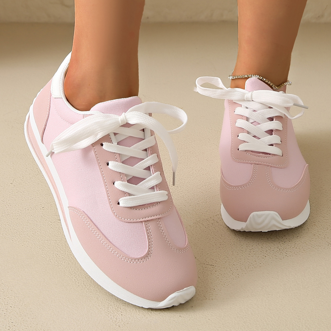 Women's retro Zippa sneakers with supportive sole, offering stability, vintage style & comfort.