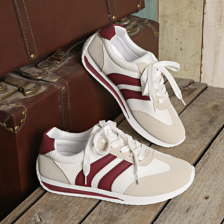 Black retro Zippa sneakers for women, sleek & stylish for everyday wear, blending vintage charm.