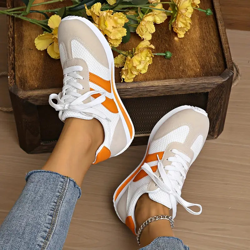 Fashion-forward women's retro Zippa sneakers, blending vintage appeal with cushioned comfort.