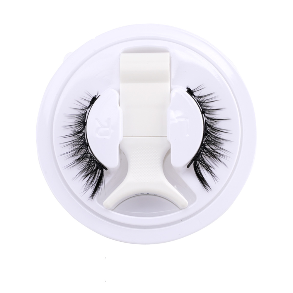 Magnetic false eyelashes set with applicator for easy, glue-free application. Reusable 3D lashes for natural beauty.