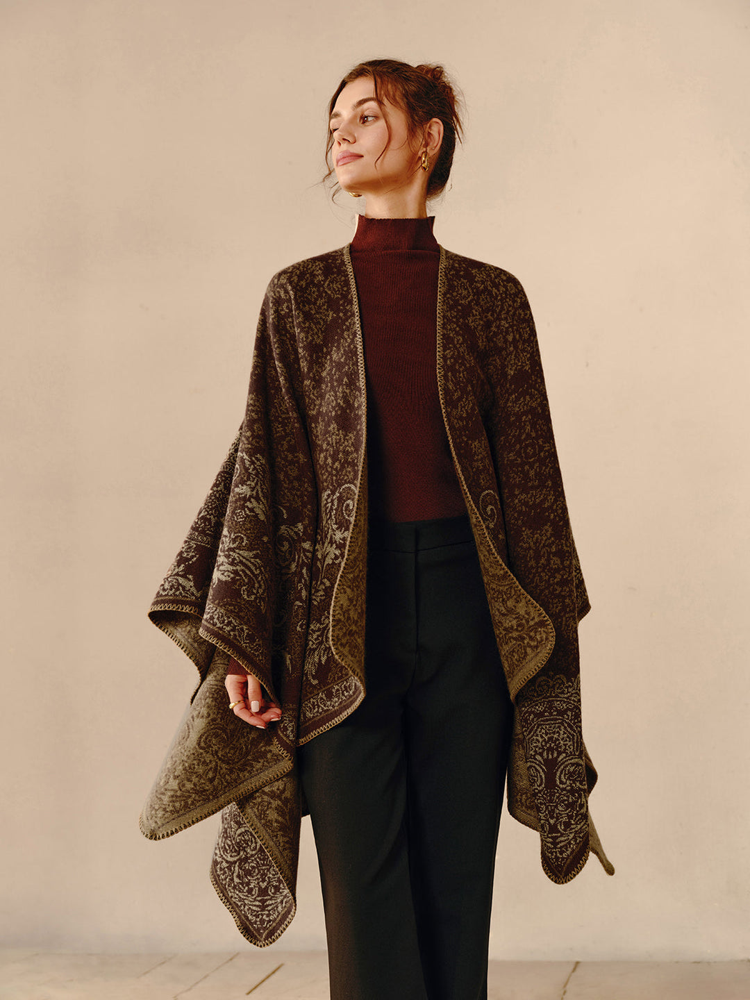 Chic women's fashion poncho, a reversible bohemian top for easy layering and elegant outerwear style.