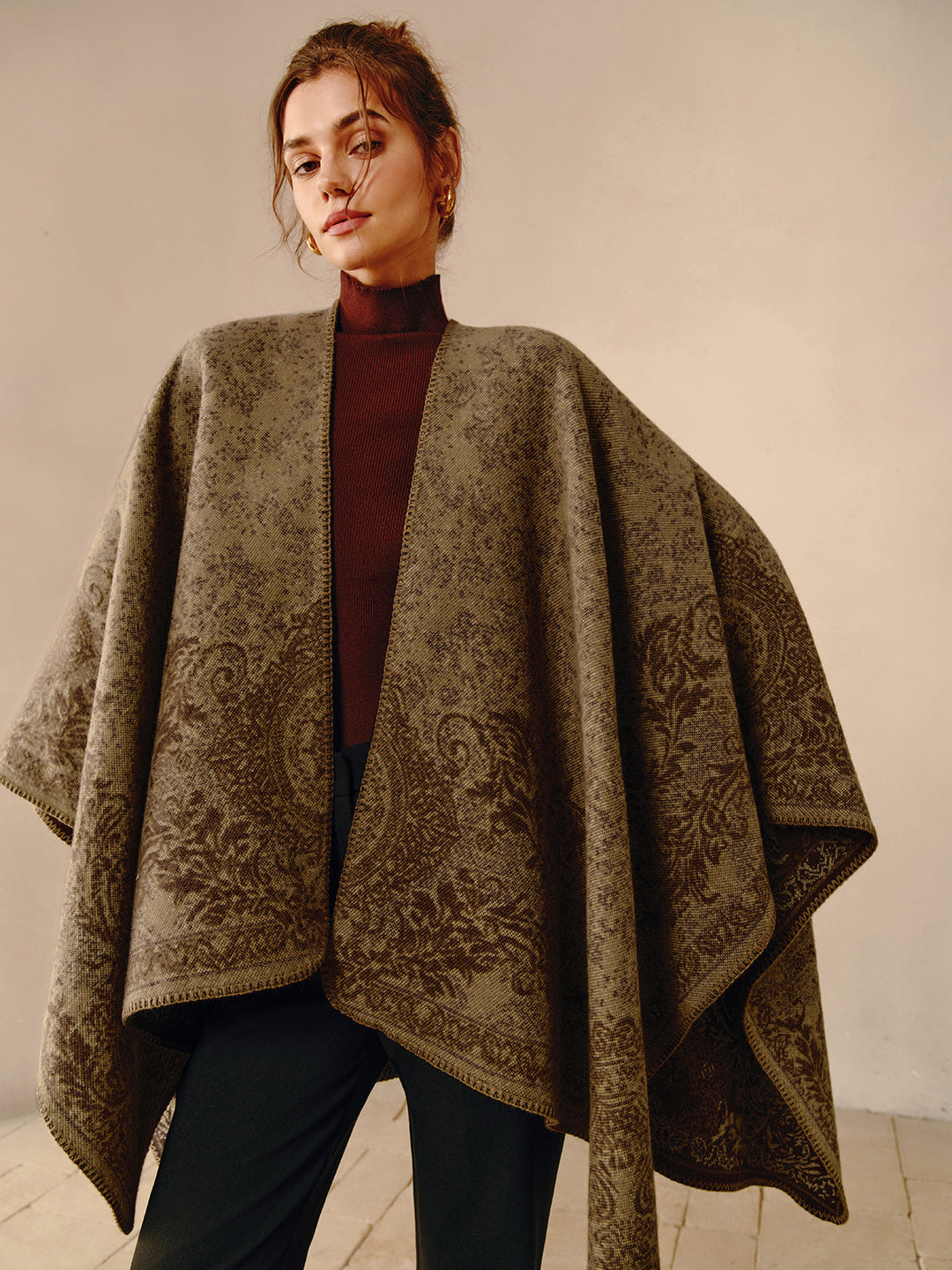 Stylish women's bohemian poncho, a reversible and comfortable wrap shawl with a unique print for elegant fashion.