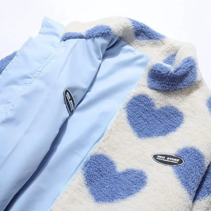 High-quality women's reversible heart jacket, providing two distinct stylish looks.