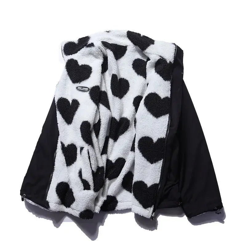 Stylish women's outerwear: reversible jacket with a subtle heart print for versatile styling.