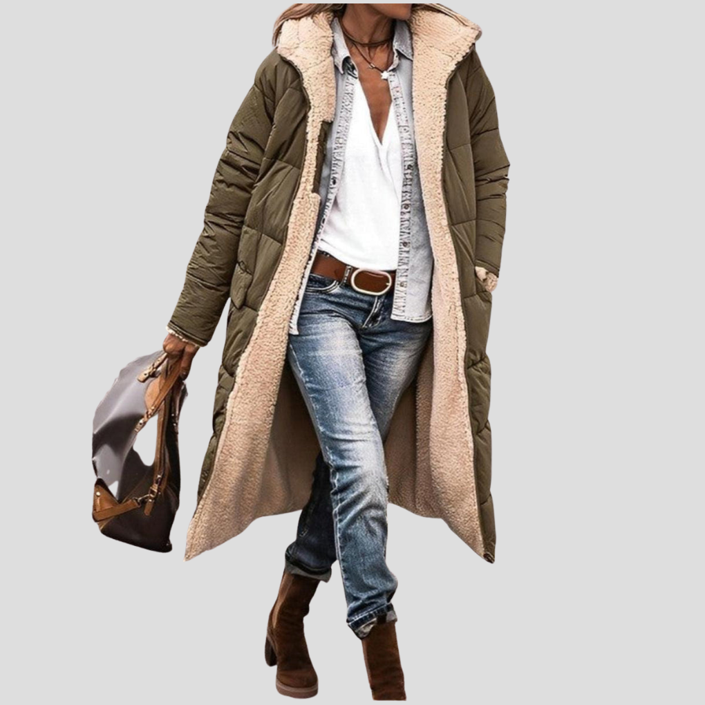 Detail of women's warm hooded winter coat, showing cozy hood and cuffs, perfect for cold weather protection.