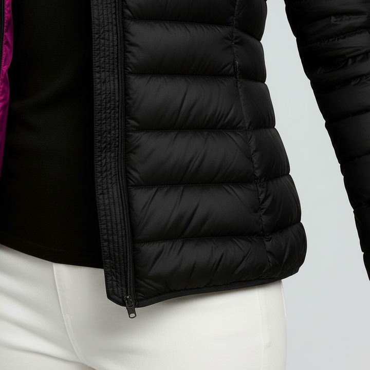 Close-up of the quilted texture on the women's reversible packable down jacket, Nina, in gray.