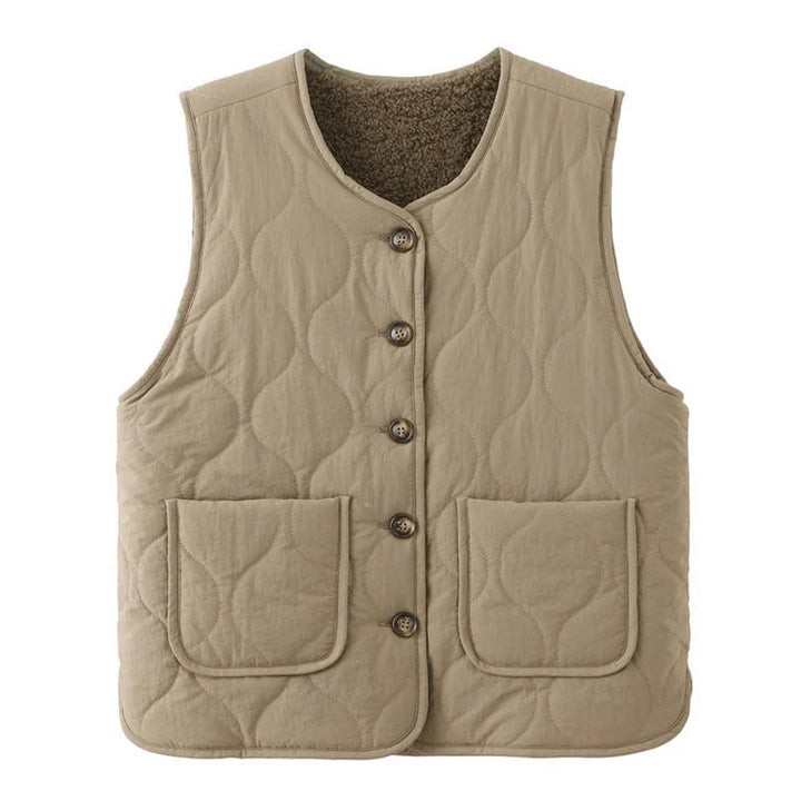 Stylish women's khaki & beige reversible quilted vest, a versatile layering piece and sleeveless jacket.