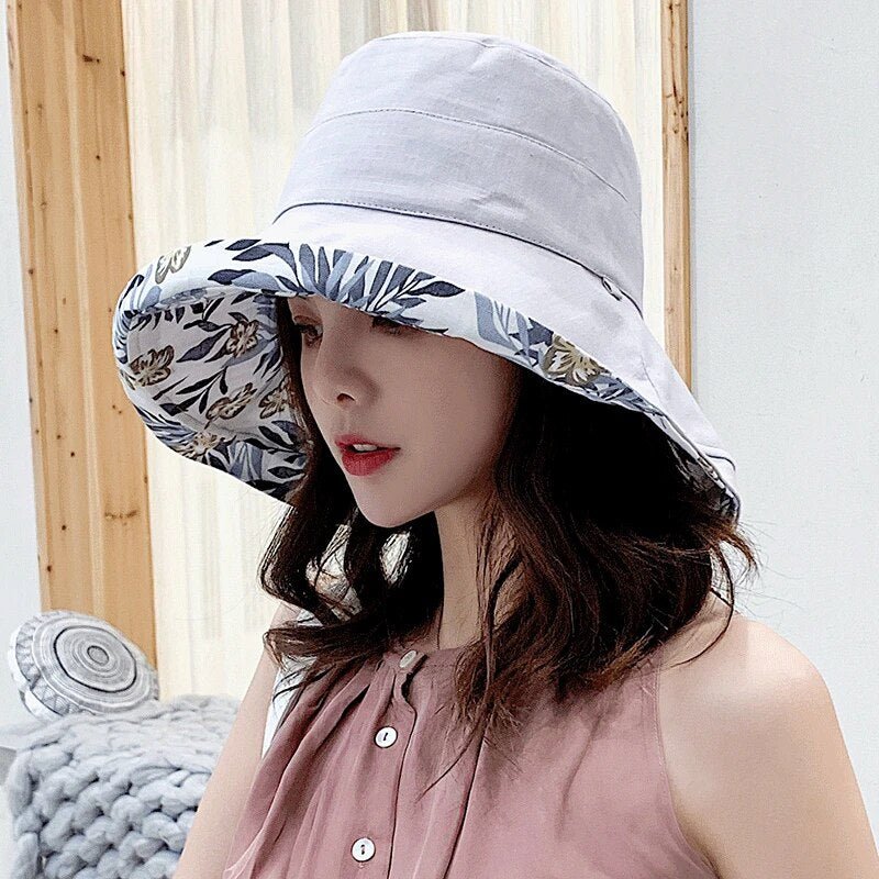 Stylish women's reversible sun hat, perfect for beach or garden, with UV protection