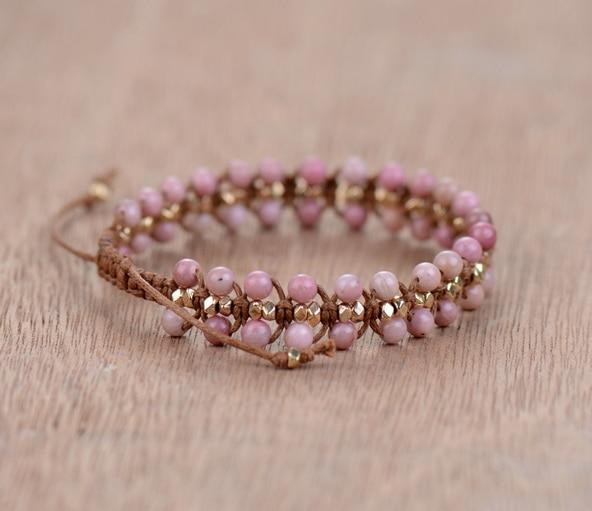 Stylish women's Rhodonite Heart Energy bracelet, a gemstone accessory for heart chakra healing and emotional well-being