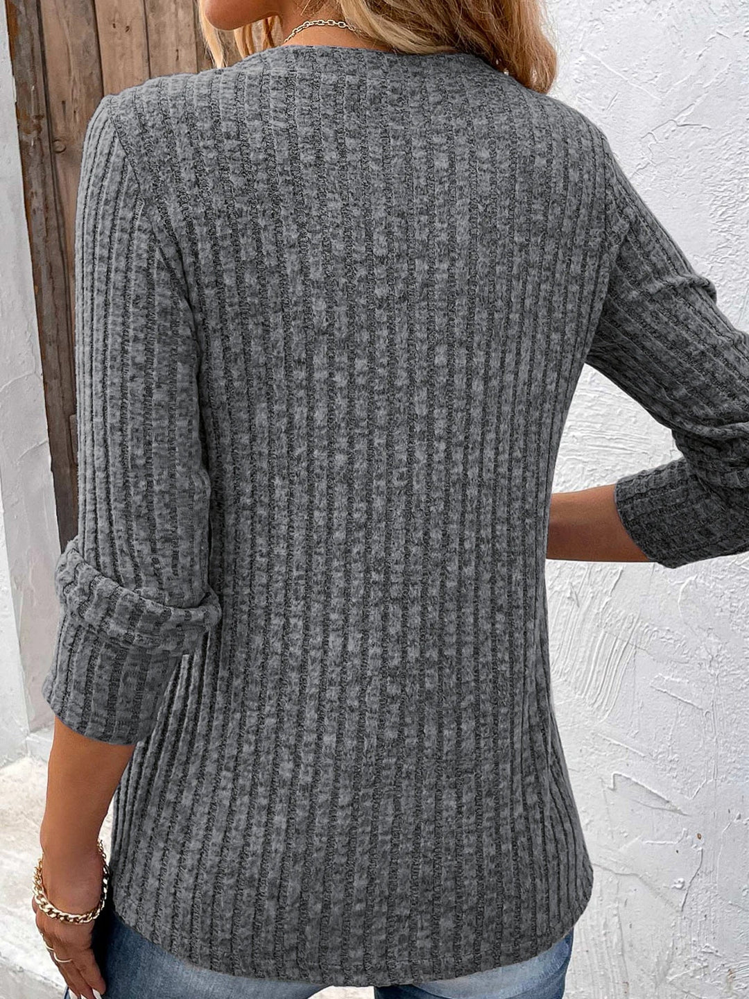 Comfortable women's ribbed knit long sleeve henley shirt. Soft texture, v-neck, & button placket. Perfect casual top.