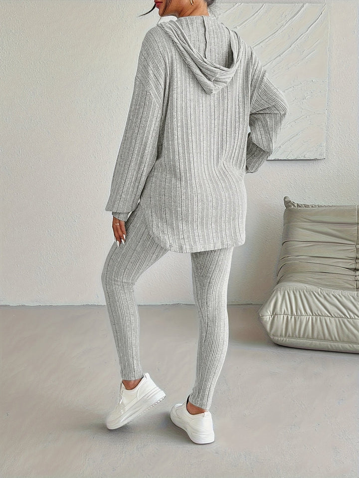 Stylish white ribbed knit lounge set. Women's cozy two-piece casual outfit, perfect for everyday comfort.