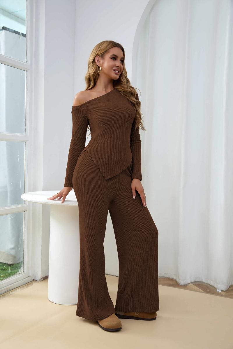 Chic women's one-shoulder ribbed two-piece set with comfortable wide-leg knit trousers, ideal for lounging.