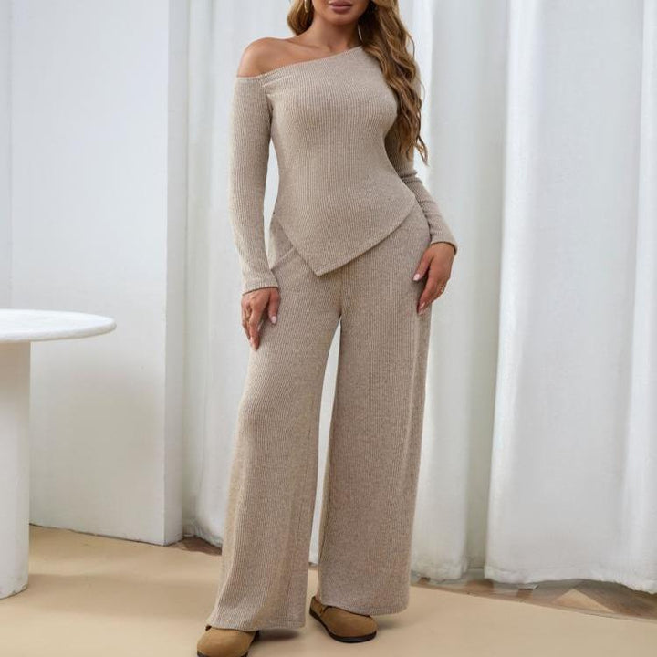 Women's ribbed knit one-shoulder two-piece set, includes a top and wide-leg trousers, great for lounge.