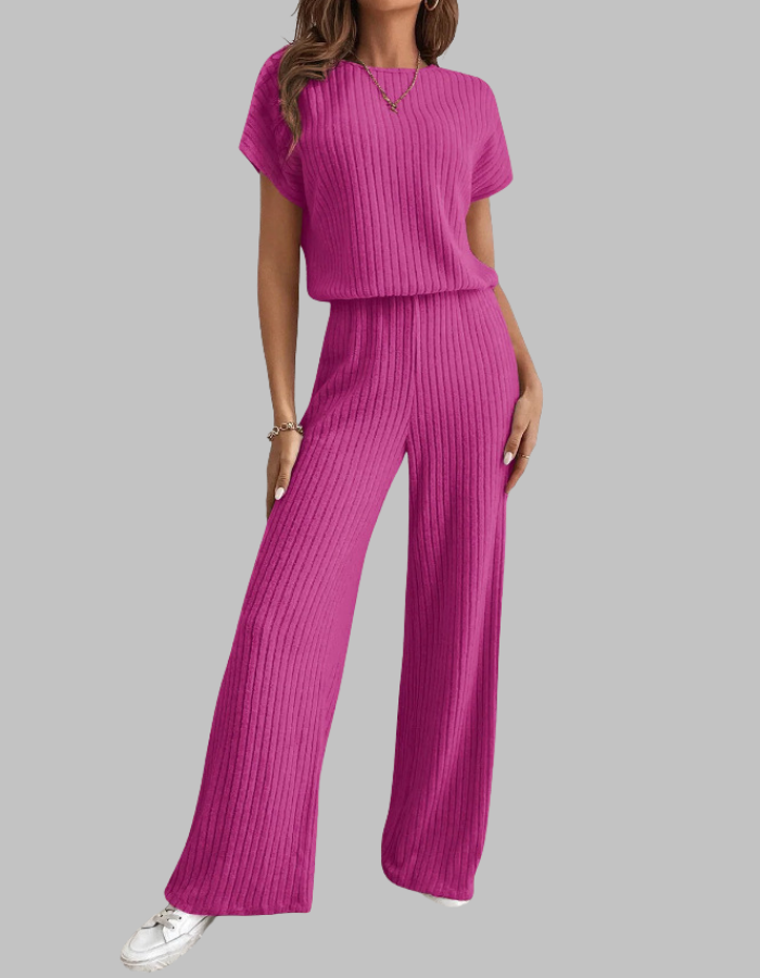 Chic women's ribbed lounge set featuring a short sleeve top & comfortable wide-leg pants. Everyday style.