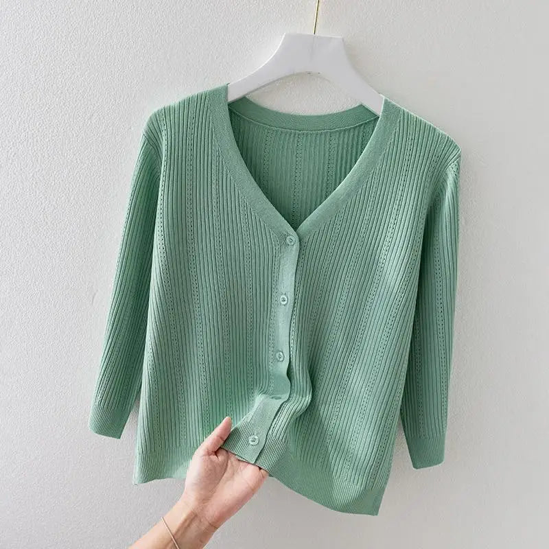 Soft knit ribbed v-neck cardigan for women, a versatile button-front fashion piece.