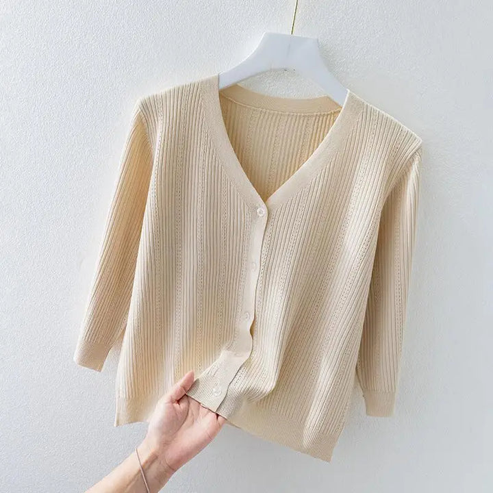 Stylish women's ribbed v-neck knit cardigan, perfect for comfortable and chic layering.