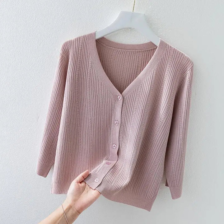 Button-front women's v-neck ribbed knit cardigan, offering soft, comfortable women's fashion.