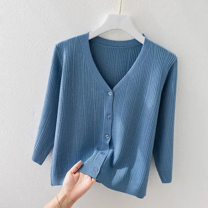 Comfortable women's ribbed knit v-neck cardigan, a versatile button-front layering essential.