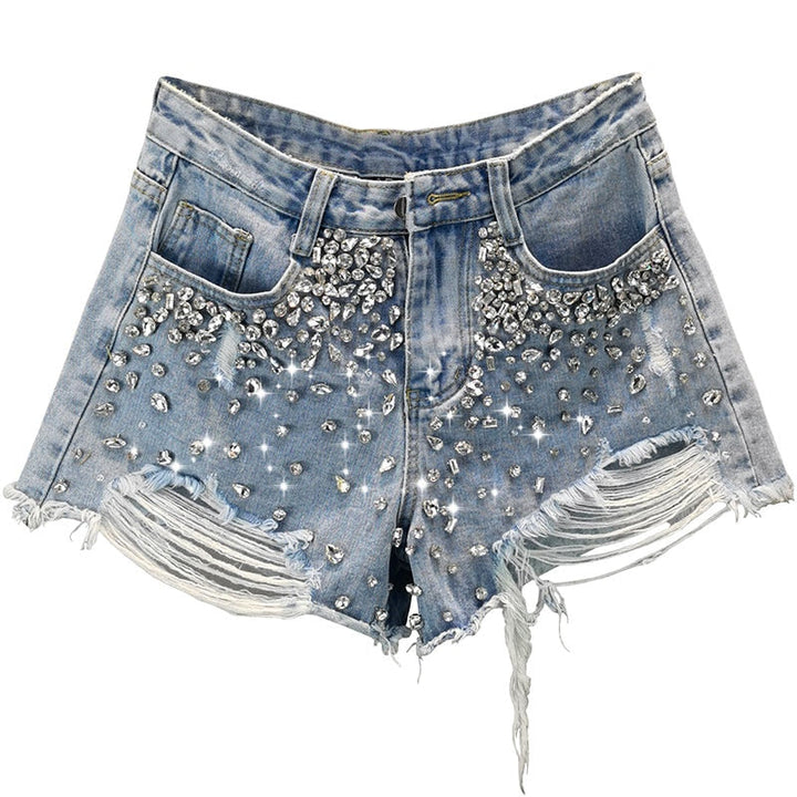 Women's ripped wide-leg denim shorts for summer casual wear. Distressed, relaxed fit, and trendy high-waist style.