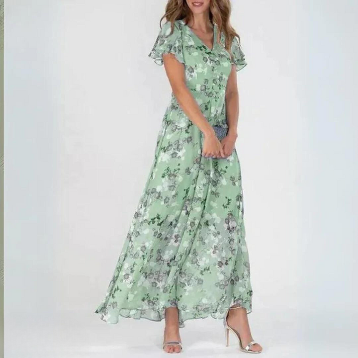 Romantic women's floral maxi dress featuring delicate flutter sleeves and a flattering V-neck, great for spring/summer.