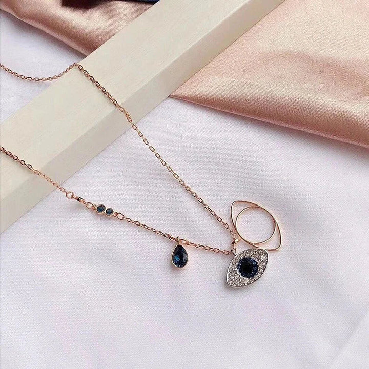 Stylish women's Evil Eye jewelry set, rose gold sterling silver necklace & bracelet, protection & fashion.