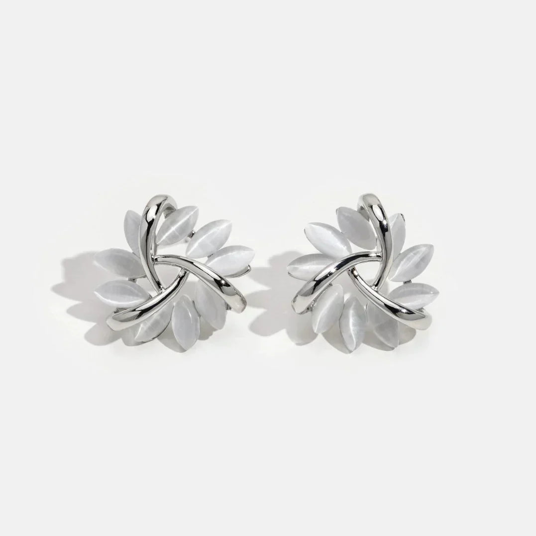 Elegant gold & opal flower stud earrings for women, a delicate fashion accessory and perfect gift for her.