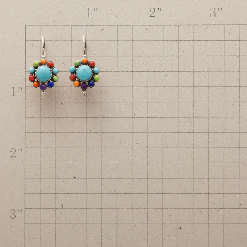 Colorful round turquoise earrings for women, featuring a unique boho-inspired design; a chic fashion accessory.