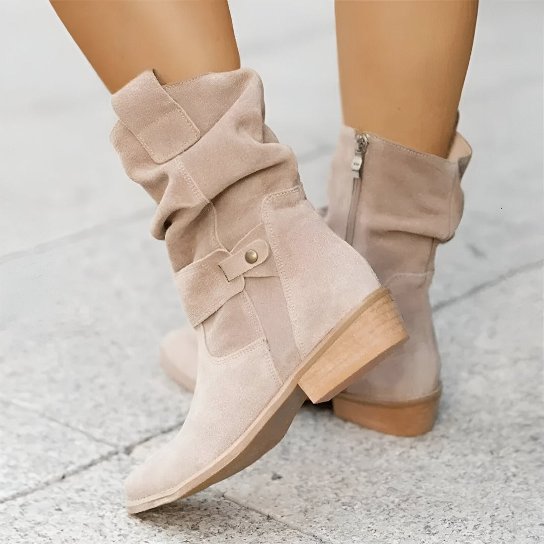 Women's ruched ankle boots with cushioned comfort & easy side zip. Perfect for fall & winter everyday style.