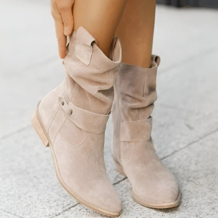 Experience ultimate comfort in these women's ruched ankle boots. Cushioned footbed & easy side zip for effortless fall/winter style.