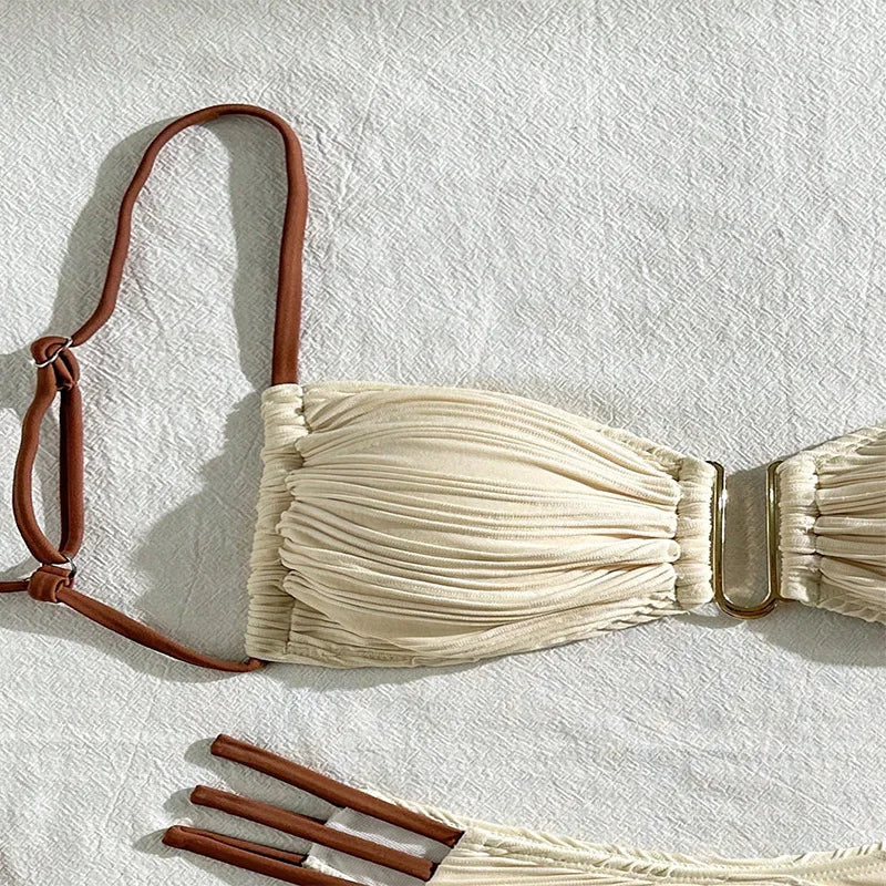 Women's boho ruched bandeau bikini set, adjustable two-piece swimwear. Tulum style beachwear for summer.