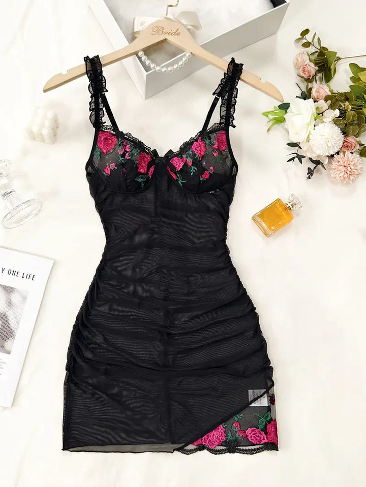 Romantic women's sleepwear: a sheer ruched mesh nightgown adorned with beautiful floral embroidery.