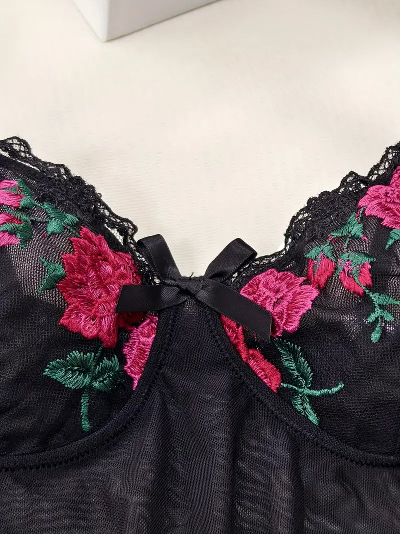 Full view of a women's ruched mesh nightgown, showcasing its sexy design and floral details.