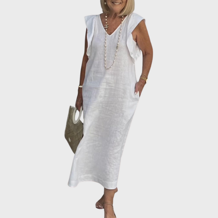 Women's ruffle shoulder V-neck sleeveless maxi dress with pockets, perfect for summer elegance.