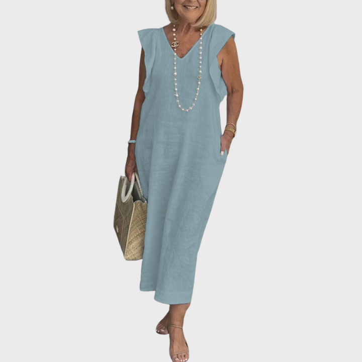 Women's ruffle shoulder V-neck sleeveless maxi dress with pockets, offering comfort & style for summer.