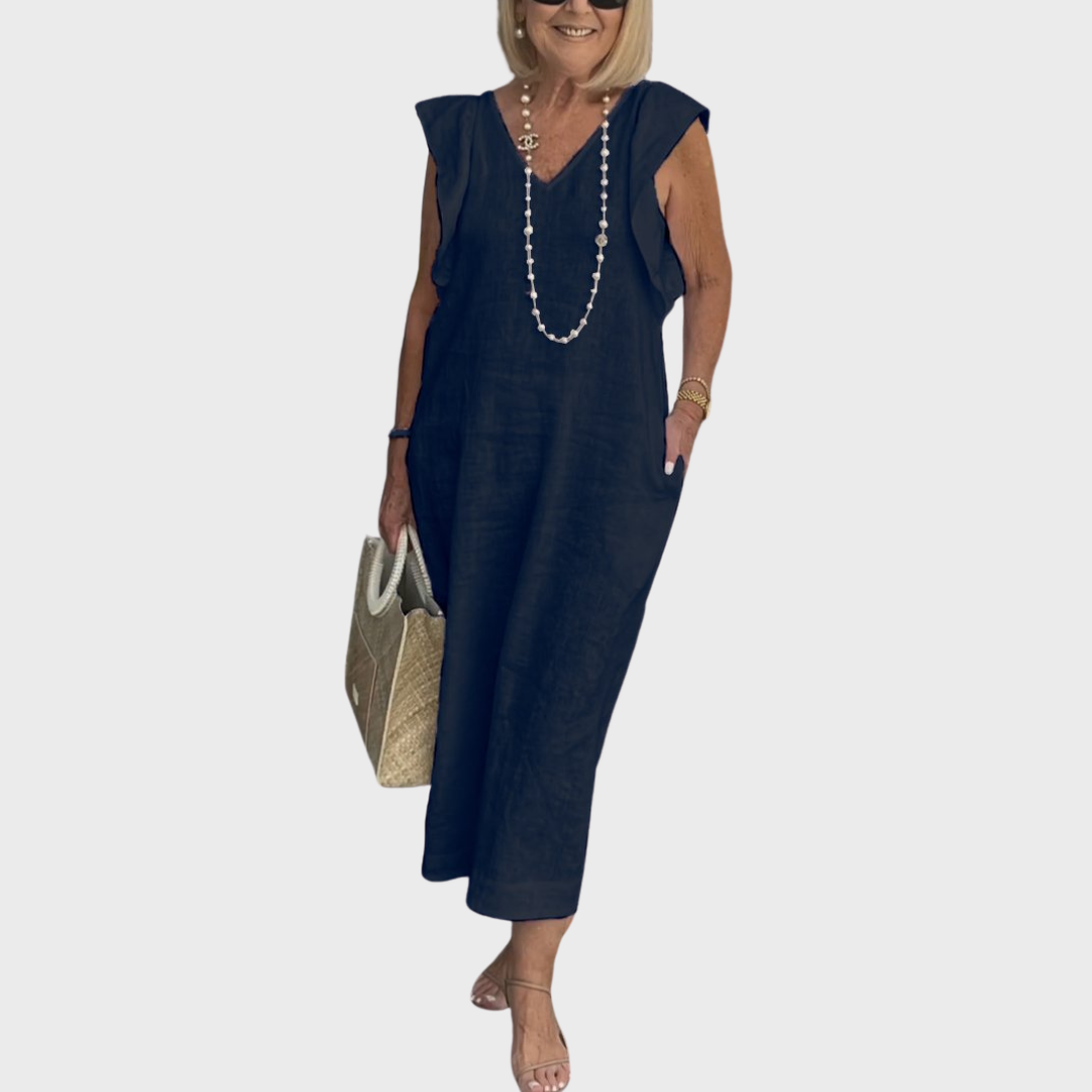 Elegant women's V-neck maxi dress with stylish ruffle shoulders, sleeveless design, and functional pockets.