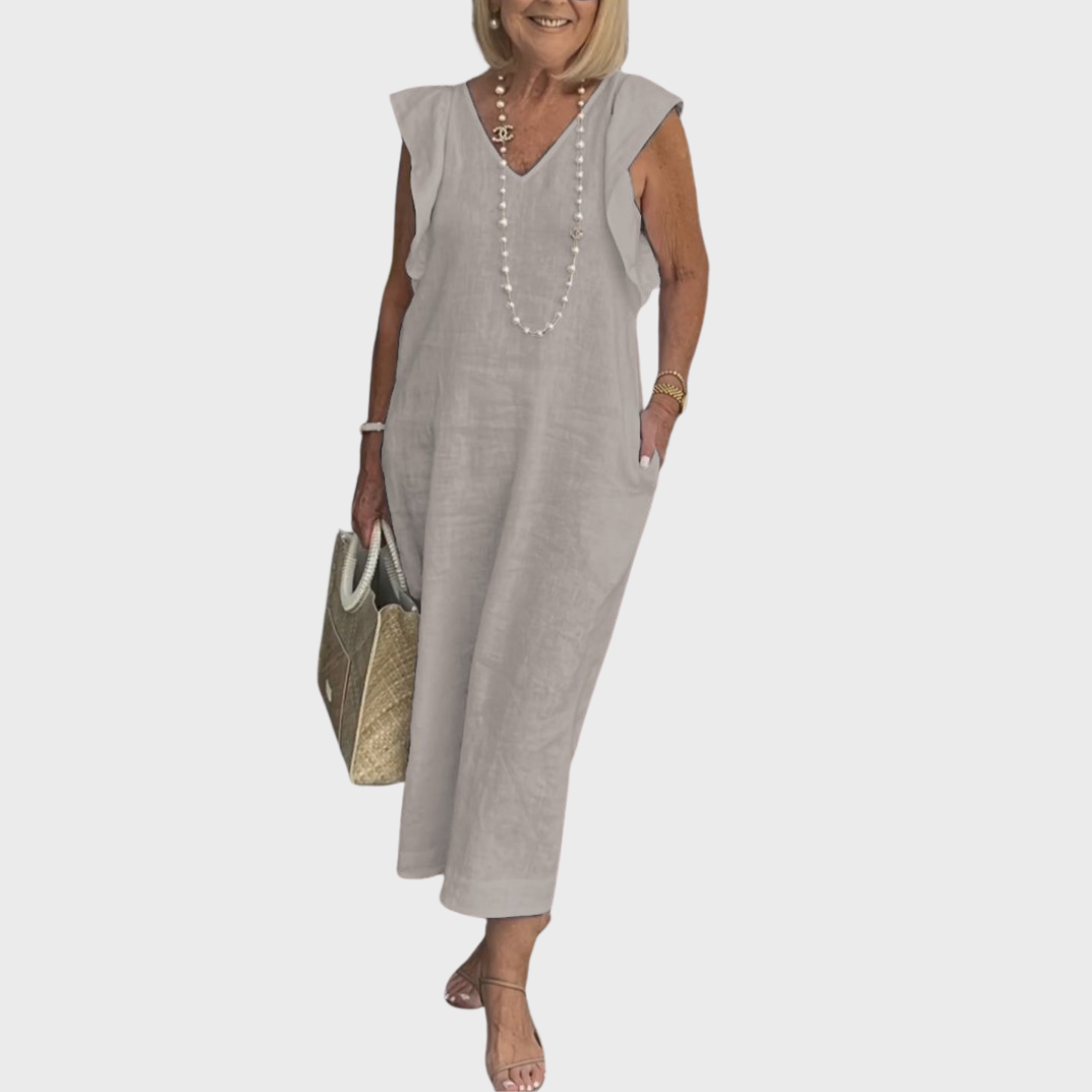 Women's V-neck sleeveless maxi dress with ruffle shoulders & pockets, great for casual summer outings.