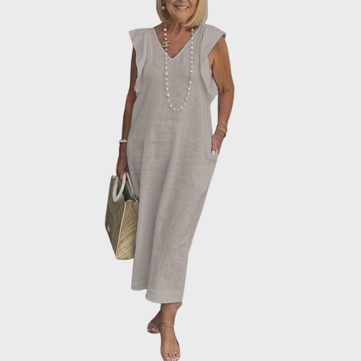 Women's V-neck sleeveless maxi dress with ruffle shoulders & pockets, great for casual summer outings.
