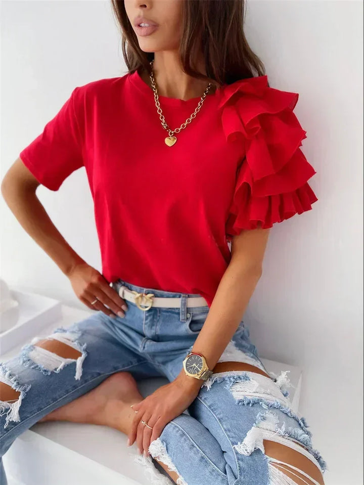 Women's Ruffle Sleeve Top, elegant & versatile for casual chic style. Perfect summer blouse with unique design.