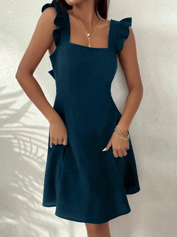 Versatile women's A-line mini dress, ruffle straps, and an attractive bow back for any occasion.