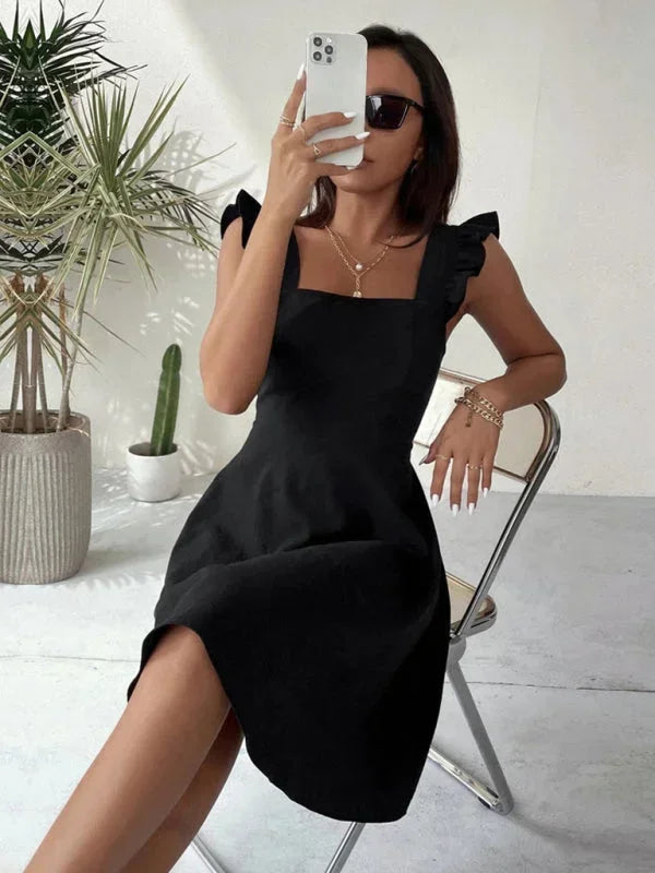 Elegant women's casual mini dress, ruffle straps, A-line shape, and a sweet bow back detail.