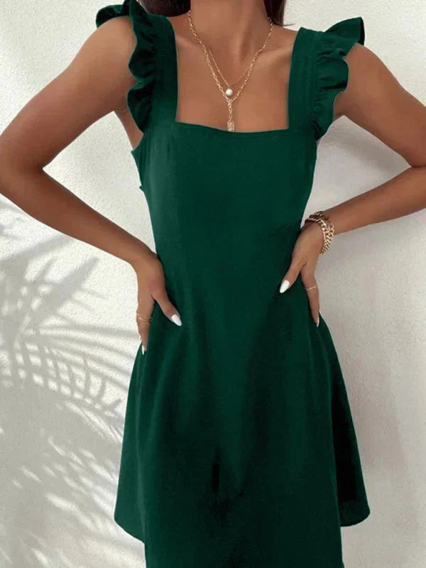 Casual yet chic A-line mini dress with ruffle straps and an adorable bow detail on the back.