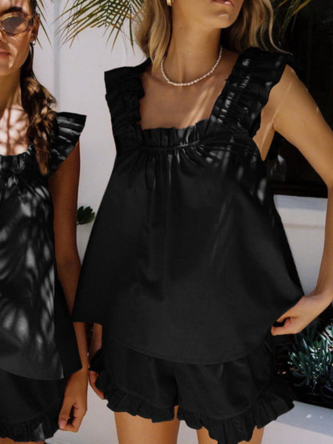 Stylish women's summer pajama set with delicate ruffles and comfortable fit