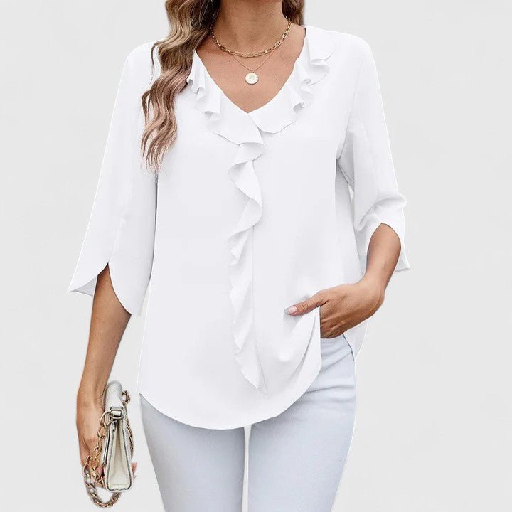 Stylish women's spring blouse with a flattering ruffle V-neck and trendy split sleeves for a fresh summer top.