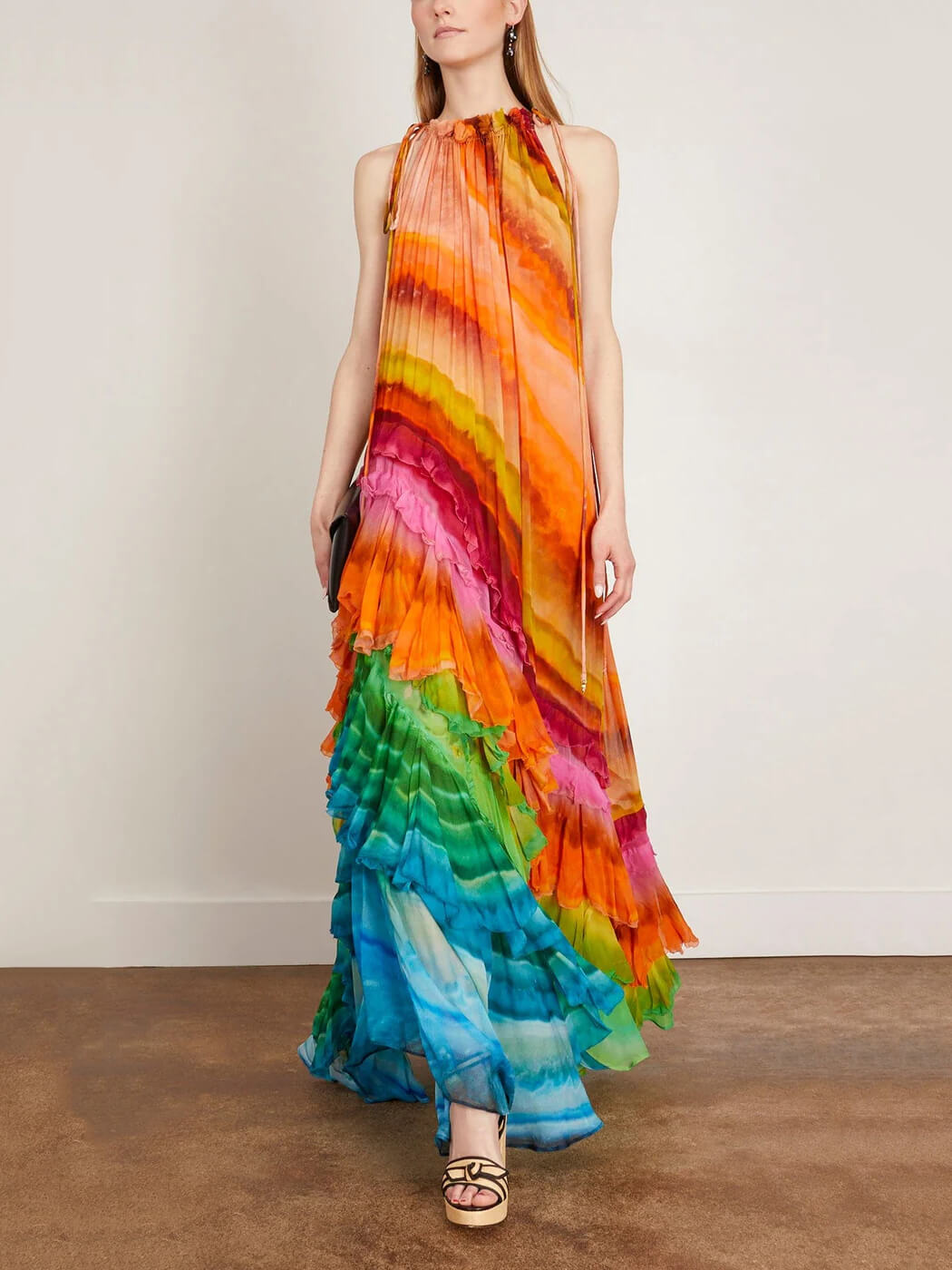 Stylish women's ruffled maxi dress with a halter neckline, sleeveless and tiered, great for elegant summer occasions.