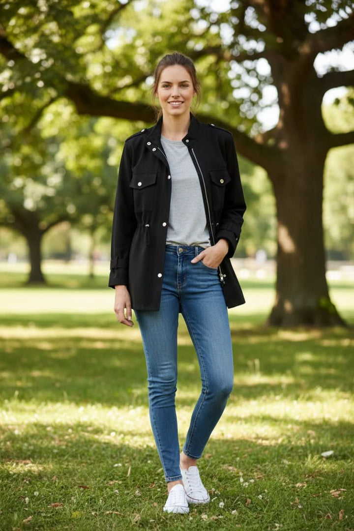 Versatile women's rugged utility jacket. Features a unique open back design for modern spring/fall outfits.