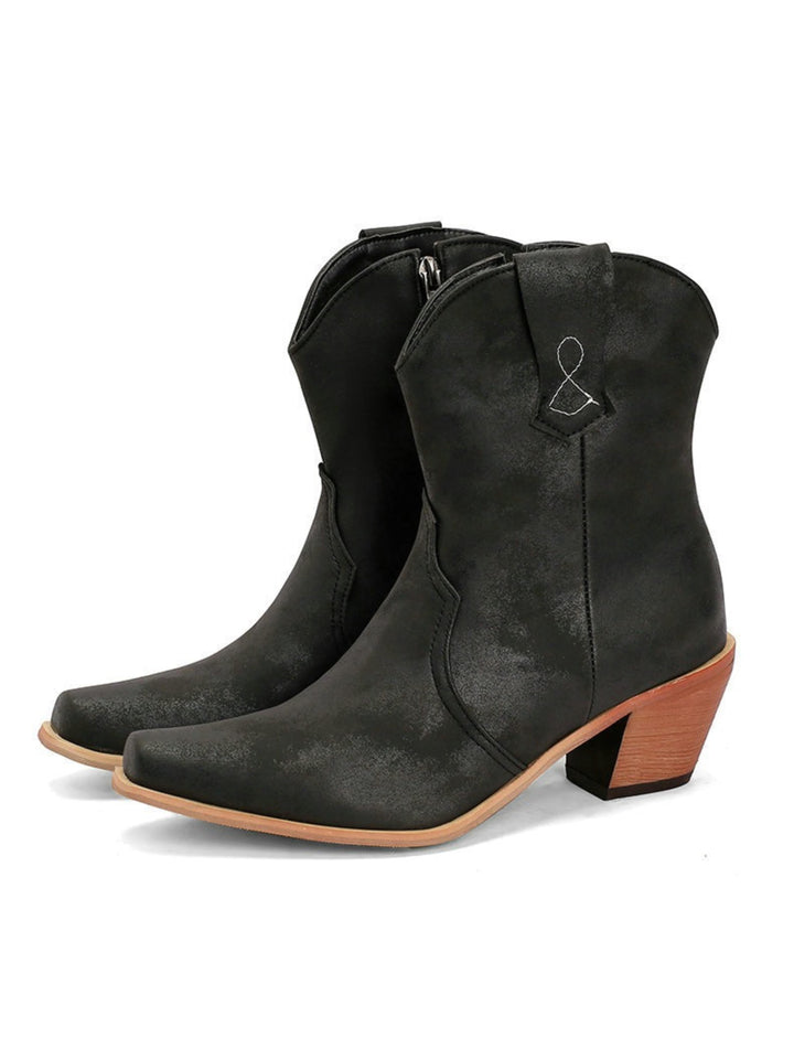 Comfortable black wide calf snip toe cowgirl boots for women, rustic western style with durable block heel.