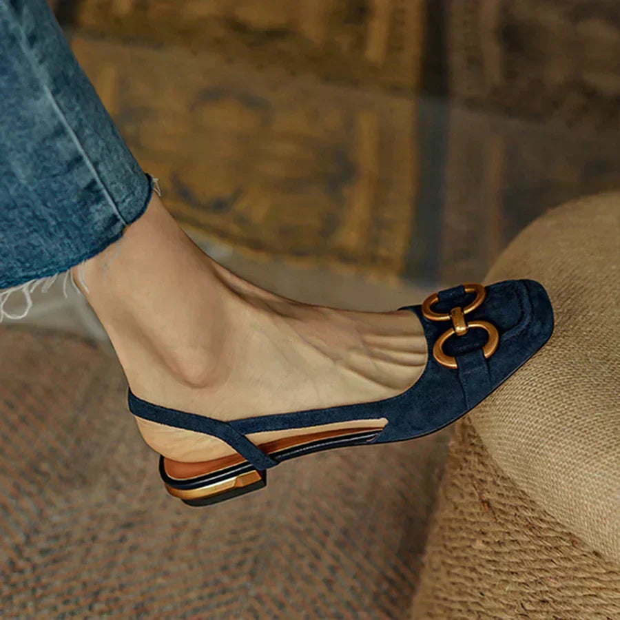 Stylish women's summer sandals with adjustable buckle straps, open toe, and cushioned flat footbed.