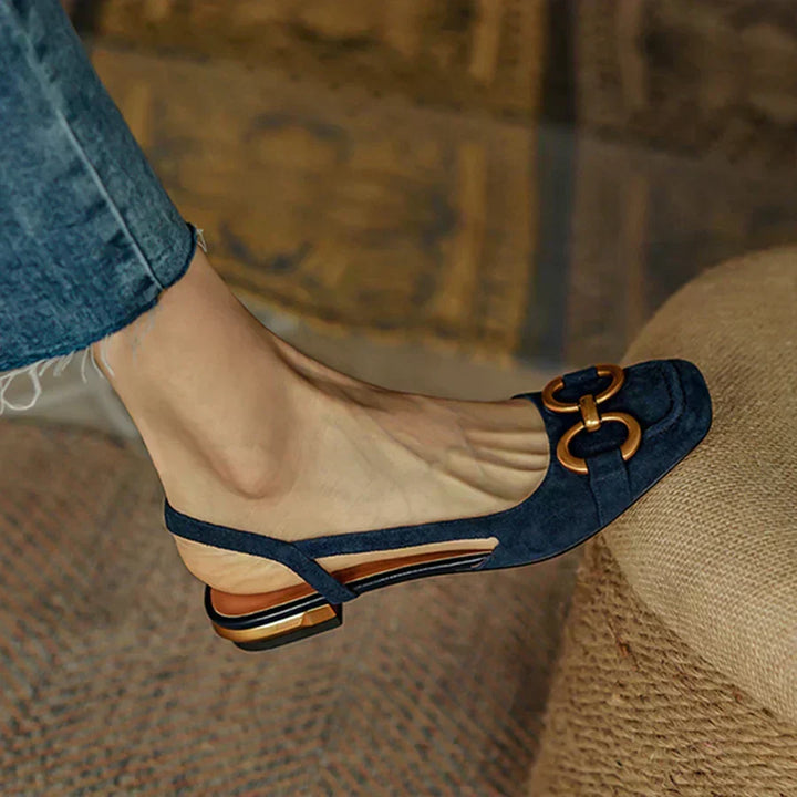 Stylish women's summer sandals with adjustable buckle straps, open toe, and cushioned flat footbed.